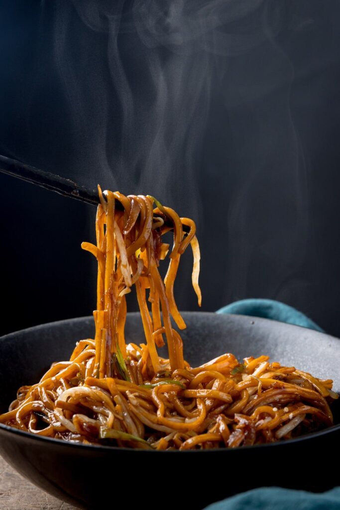 Steaming hot Sagar Agro Noodles with perfect texture in a black bowl
